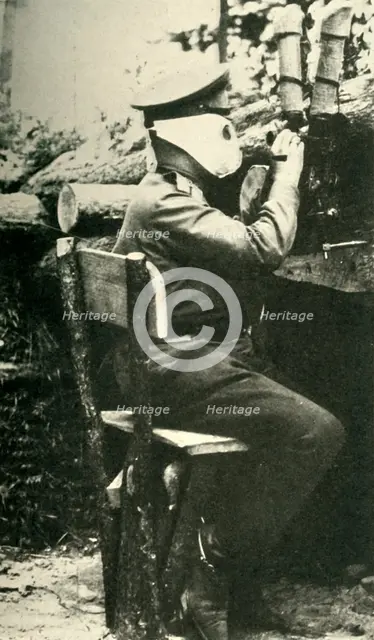 Russian soldier using a periscope rifle, First World War, 1914-1918, (c1920). Creator: Unknown.