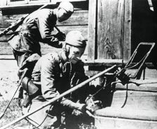 Russian soldiers with mine detectors clearing a booby-trapped house, Eastern Front, 1944