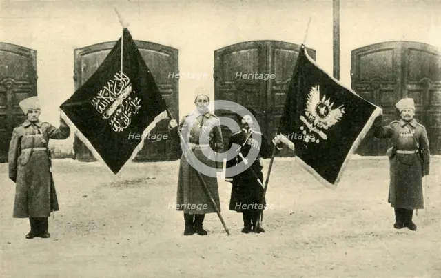 Russian soldiers with captured Turkish flags, First World War, 1915-1916, (c1920). Creator: Unknown.