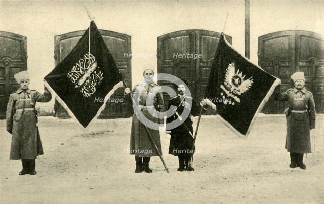 Russian soldiers with captured Turkish flags, First World War, 1915-1916, (c1920). Creator: Unknown.