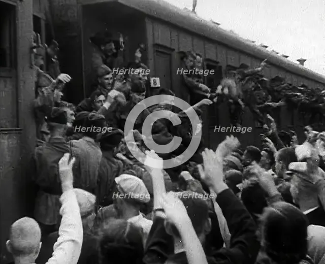 Russian Soldiers Being Waved to as They Head Off to the Front by Train, 1941. Creator: British Pathe Ltd.