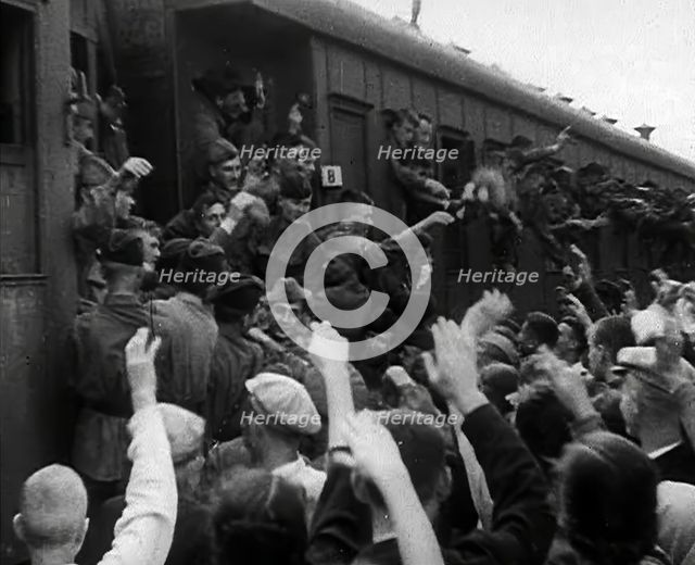 Russian Soldiers Being Waved to as They Head Off to the Front by Train, 1941. Creator: British Pathe Ltd.