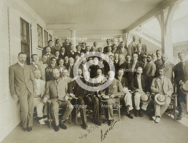 Russians & newspaper men - Sergei Witte, Baron Rosen with their suite and newspaper men, 1905. Creator: Perry Enoch Conner.