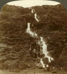 Rustoen Falls, as they come out of the sky, above Rustoefjeld heights, Norway c1905. Creator: Unknown