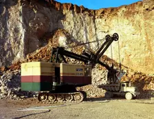 Ruston-Bucyrus 110-RB face shovel loading a Euclid dumper, Steetley quarry, Nottinghamshire, 1967. Creator: Michael Walters