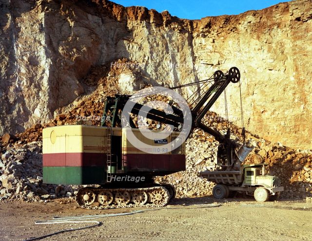 Ruston-Bucyrus 110-RB face shovel loading a Euclid dumper, Steetley quarry, Nottinghamshire, 1967. Artist: Michael Walters