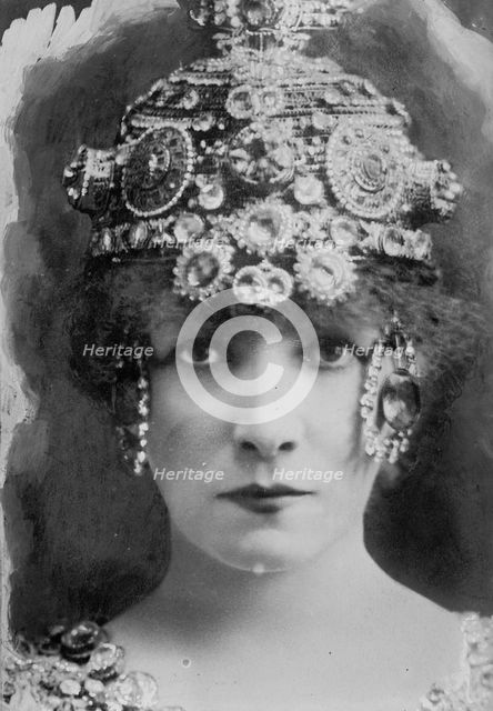 S. Bernhardt with elaborate headdress, 1912. Creator: Bain News Service.