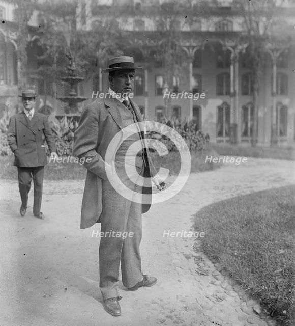 Wm. Barnes, Jr., standing outside in park, 1910. Creator: Bain News Service.