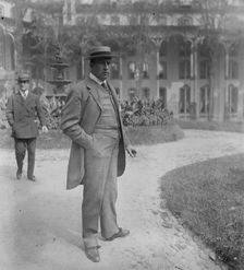 Wm. Barnes, Jr., standing outside in park, 1910. Creator: Bain News Service