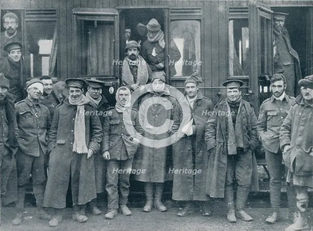 Wounded English troops on their way to a base hospital, c1914. Artist: Unknown