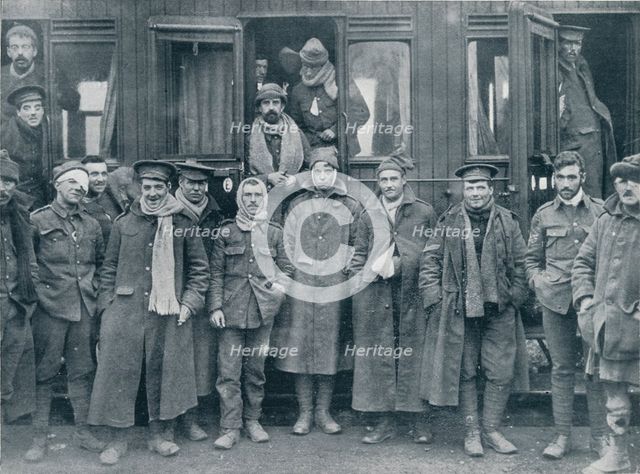 Wounded English troops on their way to a base hospital, c1914. Artist: Unknown