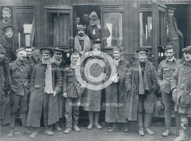Wounded English troops on their way to a base hospital, c1914. Artist: Unknown
