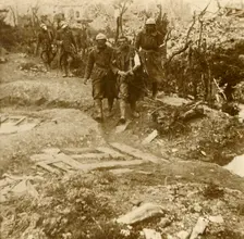 Wounded French infantrymen arriving at Chateau d'Esnes, Verdun, northern France, 1916
