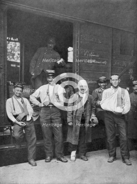 Wounded French soldiers on the way to hospital by train France, 1914. Artist: Unknown