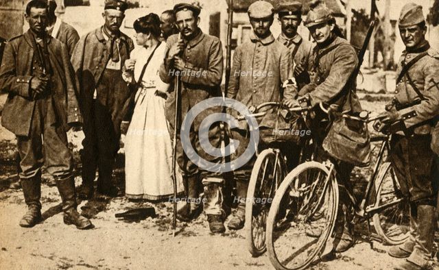 Wounded German prisoners are cared for by the Red Cross, France, First World War, 1914-1918, (1933). Creator: Unknown.