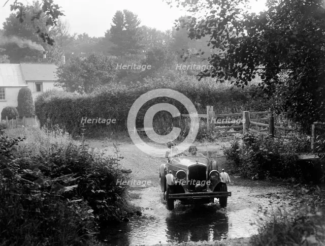 Wolseley competing in the B&HMC Brighton-Beer Trial, Windout Lane, near Dunsford, Devon, 1934. Artist: Bill Brunell.