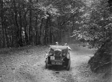 Wolseley Hornet McEvoy Special, B&HMC Brighton-Beer Trial, Fingle Bridge Hill, Devon, 1934. Artist: Bill Brunell