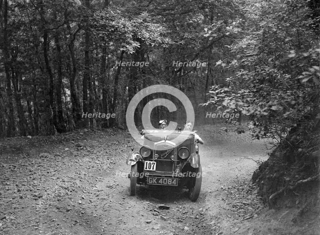 Wolseley Hornet McEvoy Special, B&HMC Brighton-Beer Trial, Fingle Bridge Hill, Devon, 1934. Artist: Bill Brunell.