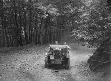 Wolseley Hornet McEvoy Special, B&HMC Brighton-Beer Trial, Fingle Bridge Hill, Devon, 1934. Artist: Bill Brunell