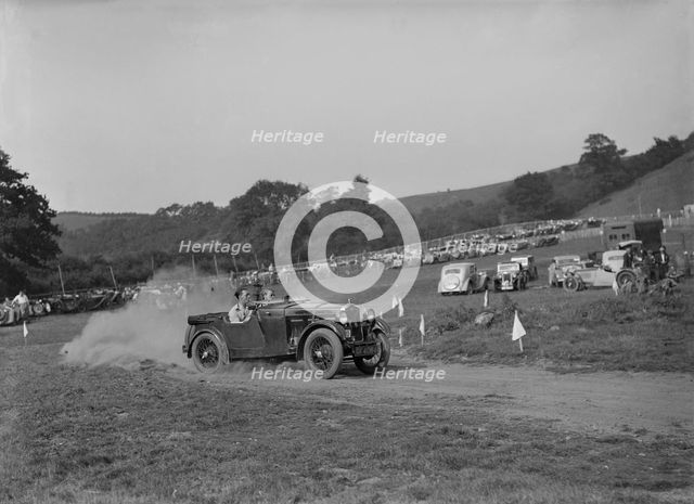 Wolseley Hornet McEvoy Special competing in the MG Car Club Rushmere Hillclimb, Shropshire, 1935. Artist: Bill Brunell.