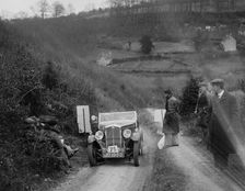 Wolseley Hornet of Miss P Goodban, North West London Motor Club London-Gloucester Trial, 1932. Artist: Bill Brunell