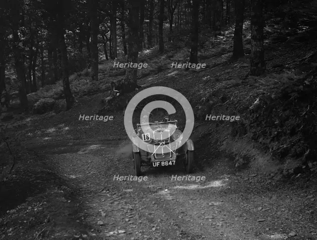 Wolseley Hornet of ARC Rigby taking part in a motoring trial, c1930s. Artist: Bill Brunell.
