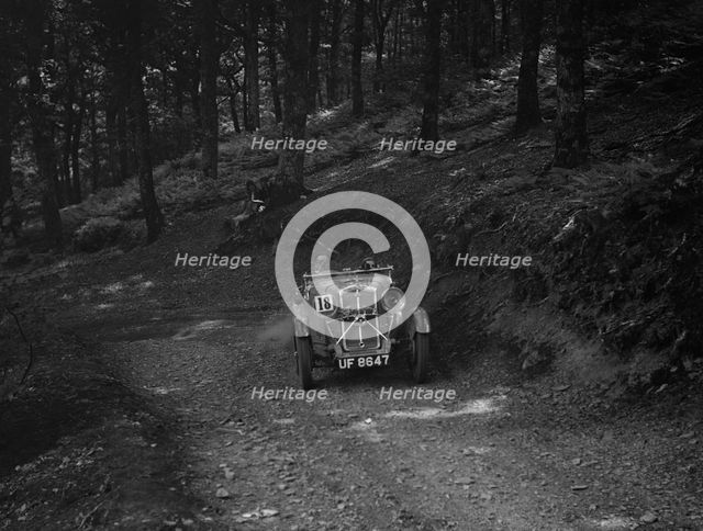 Wolseley Hornet of ARC Rigby taking part in a motoring trial, c1930s. Artist: Bill Brunell.