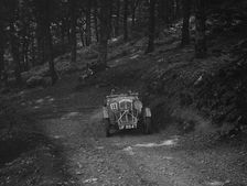 Wolseley Hornet of ARC Rigby taking part in a motoring trial, c1930s. Artist: Bill Brunell