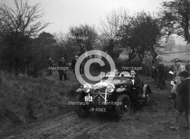 Wolseley Hornet of HK Crawford at the Sunbac Colmore Trial, near Winchcombe, Gloucestershire, 1934. Artist: Bill Brunell.