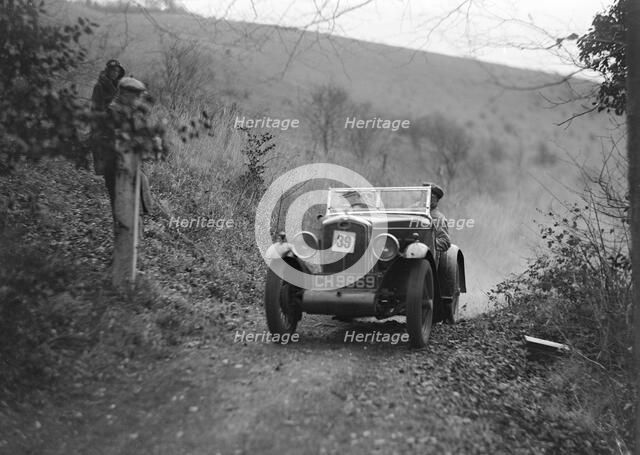 Wolseley Hornet of JM Suggs competing in the Inter-Varsity Trial, November 1931. Artist: Bill Brunell.