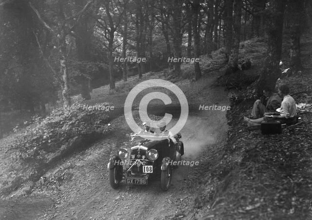 Wolseley Hornet of WAV Davis, B&HMC Brighton-Beer Trial, Fingle Bridge Hill, Devon, 1934. Artist: Bill Brunell.