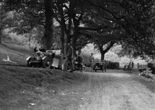 Wolseley Hornet and Morris Minor taking part in a motoring trial, c1930s. Artist: Bill Brunell