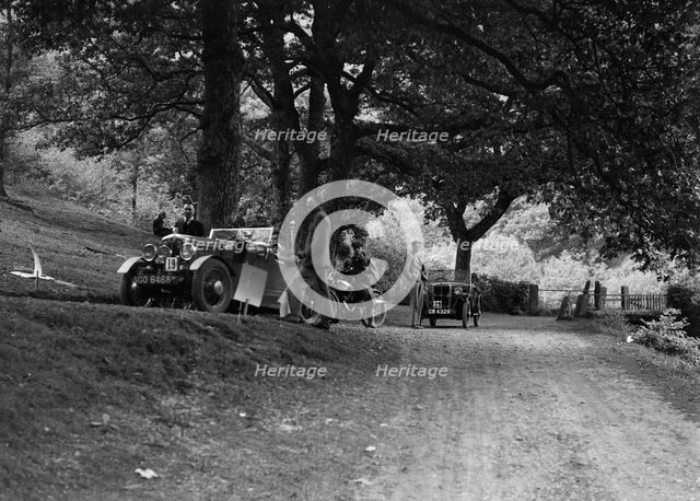 Wolseley Hornet and Morris Minor taking part in a motoring trial, c1930s. Artist: Bill Brunell.
