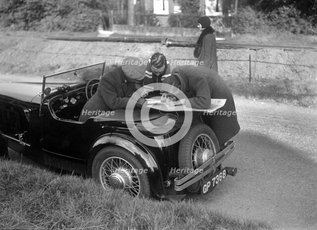 Wolseley Hornet taking part in the Bugatti Owners Club car treasure hunt, 25 October 1931. Artist: Bill Brunell.
