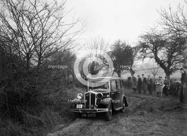 Wolseley of LL Hunt at the Sunbac Colmore Trial, near Winchcombe, Gloucestershire, 1934. Artist: Bill Brunell.