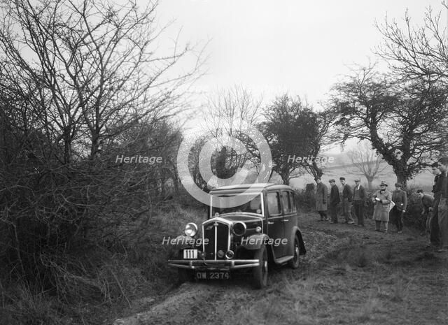 Wolseley of LL Hunt at the Sunbac Colmore Trial, near Winchcombe, Gloucestershire, 1934. Artist: Bill Brunell.