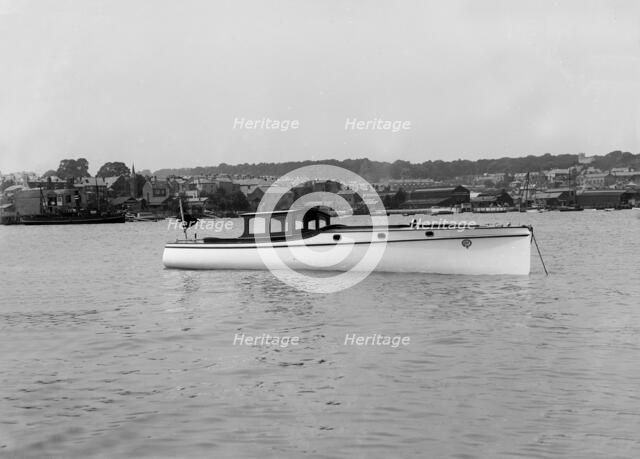 Wolseley motor launch at anchor, 1914. Creator: Kirk & Sons of Cowes.