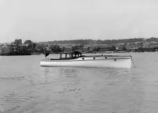 Wolseley motor launch at anchor, 1914. Creator: Kirk & Sons of Cowes