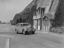 Wolseley saloon of HB Brownright and HE Symons on Madeira Drive, Brighton, RAC Rally, 1939. Artist: Bill Brunell