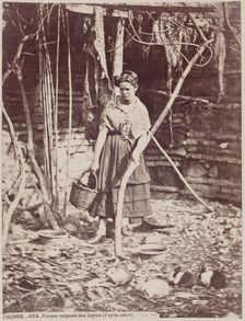 Woman Caring for Rabbits, Cordoba, c1885. Creator: Juan Laurent