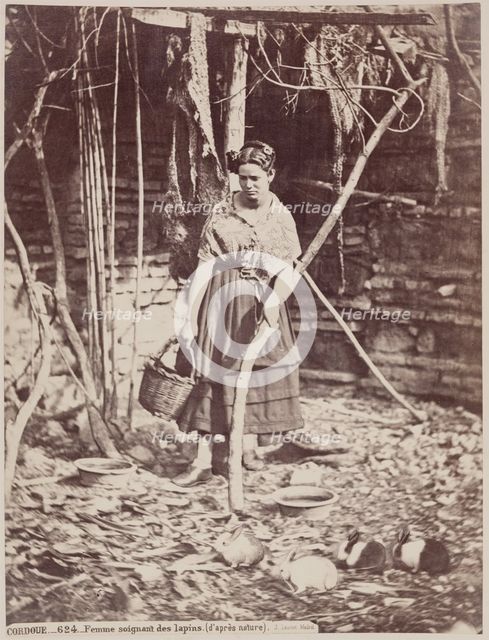 Woman Caring for Rabbits, Cordoba, c1885. Creator: Juan Laurent.