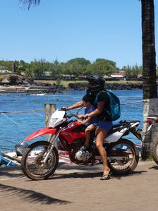 Woman and child on Honda motorcycle, Chile 2019. Creator: Unknown