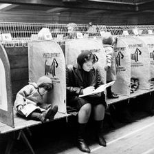 Woman and child at a London dog show, possibly Crufts, 1964. Creator: Henry Grant