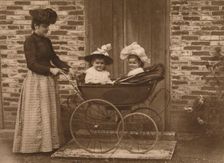Woman and children in a pushchair 1937