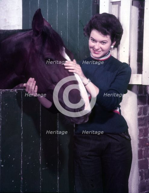 Woman and horse, c1955. Creator: Arthur Charles Kirby Ware.