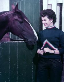Woman and horse, c1955. Creator: Arthur Charles Kirby Ware