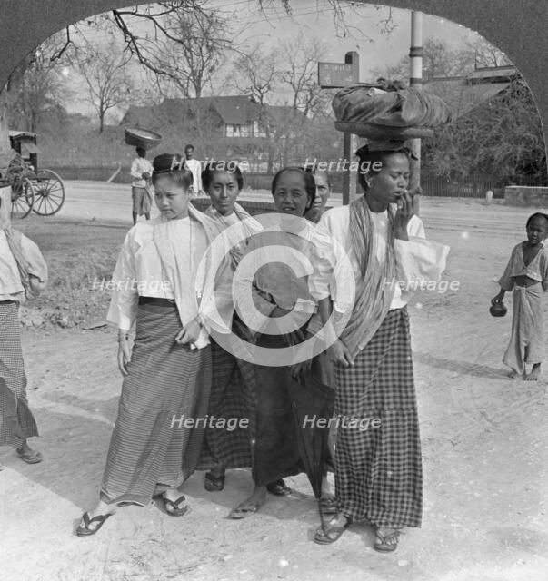 Woman and servants going to a market, Mandalay, Burma, 1908. Artist: Stereo Travel Co