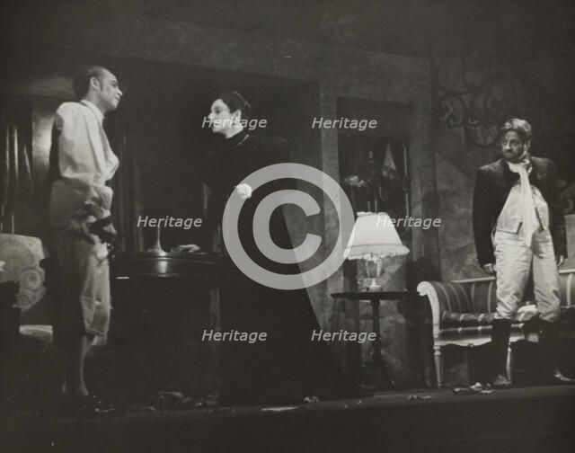 Woman and two men, standing, 1938. Creator: Unknown.