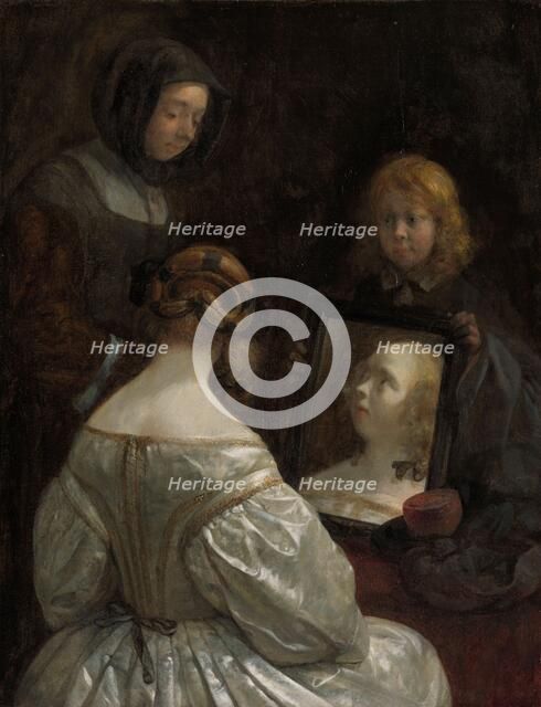 Woman at a Mirror, c.1652. Creator: Gerard Terborch II.