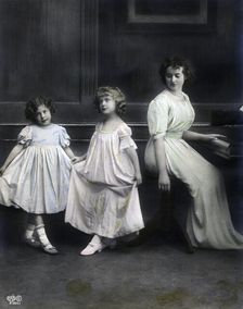 Woman at a piano with her daughters, Sweden, late 19th-early 20th century